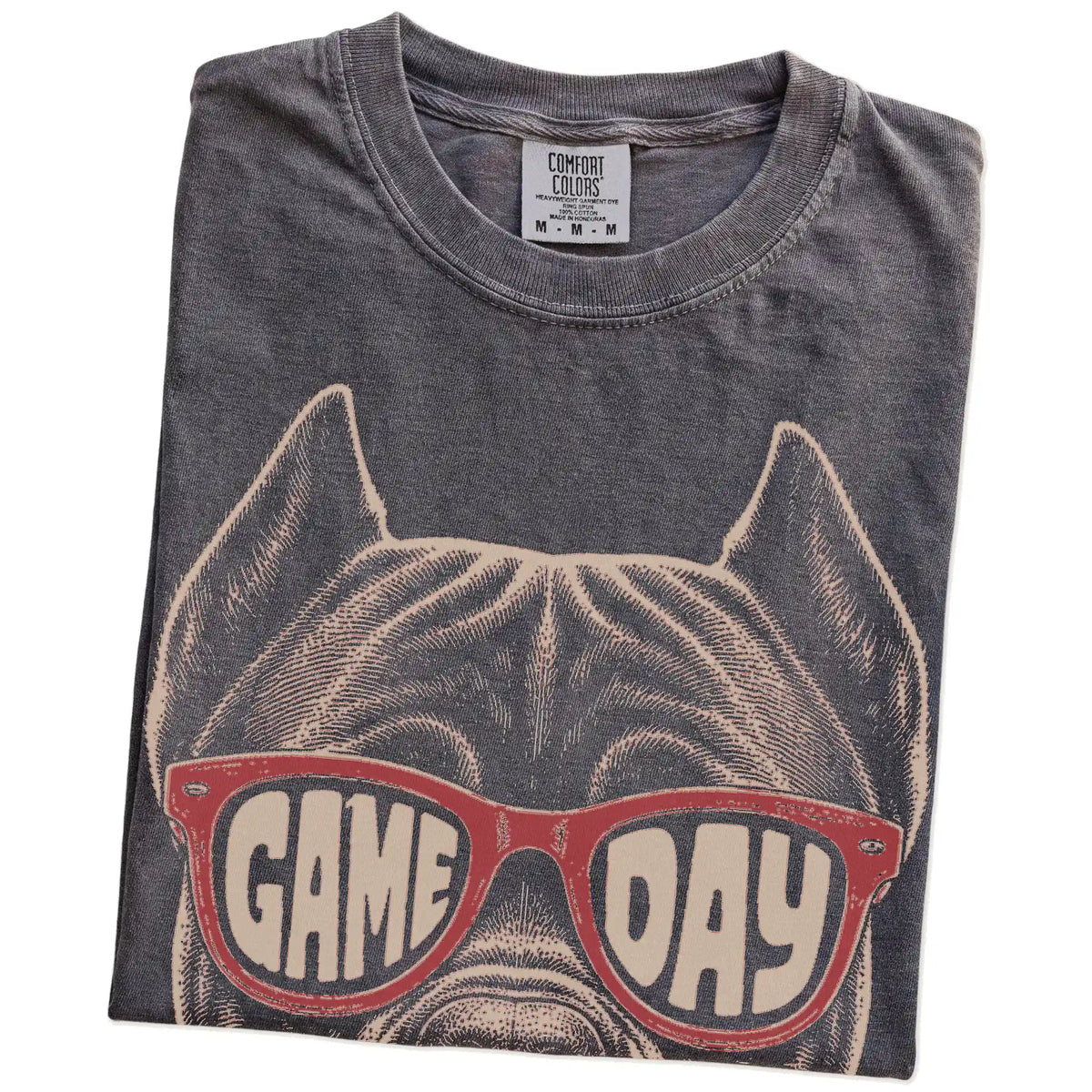 Folded Pepper Comfort Colors® T-shirt showing cane corso wearing red game day sunglasses