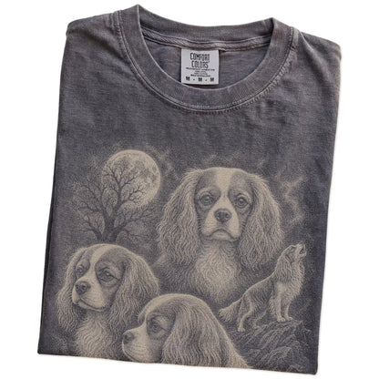 Folded Pepper Comfort Colors® T-shirt showing a vintage moon montage featuring Cavalier King Charles Spaniel
