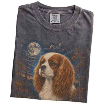 Folded Pepper Comfort Colors® t-shirt showing Cavalier King Charles Spaniel in a fall forest graphic