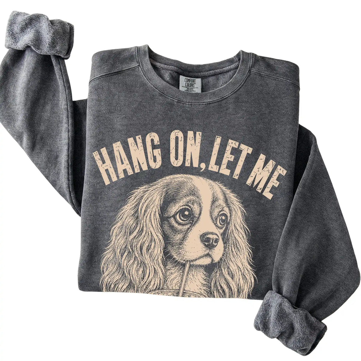 Pepper Comfort Colors sweatshirt featuring Cavalier King Charles Spaniel Iced Coffee Overthink, folded presentation