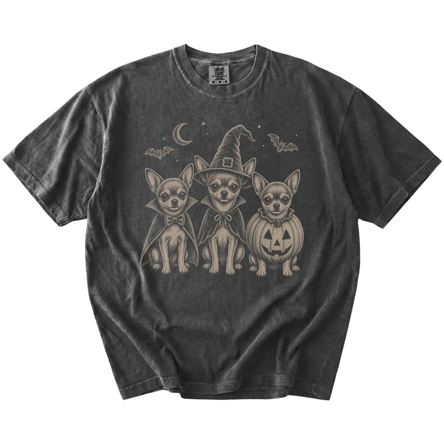 Three Chihuahua dogs dressed for Halloween beneath bats and a crescent moon on a Pepper Comfort Colors® T-shirt