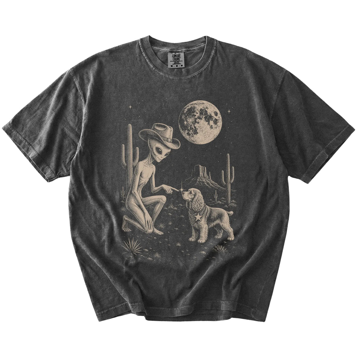 Cowboy alien fist-bumping a Cocker Spaniel beneath the moon on a Pepper Comfort Colors® T-shirt
