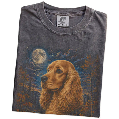 Folded pepper T-shirt with Cocker Spaniel Autumn Moon artwork.