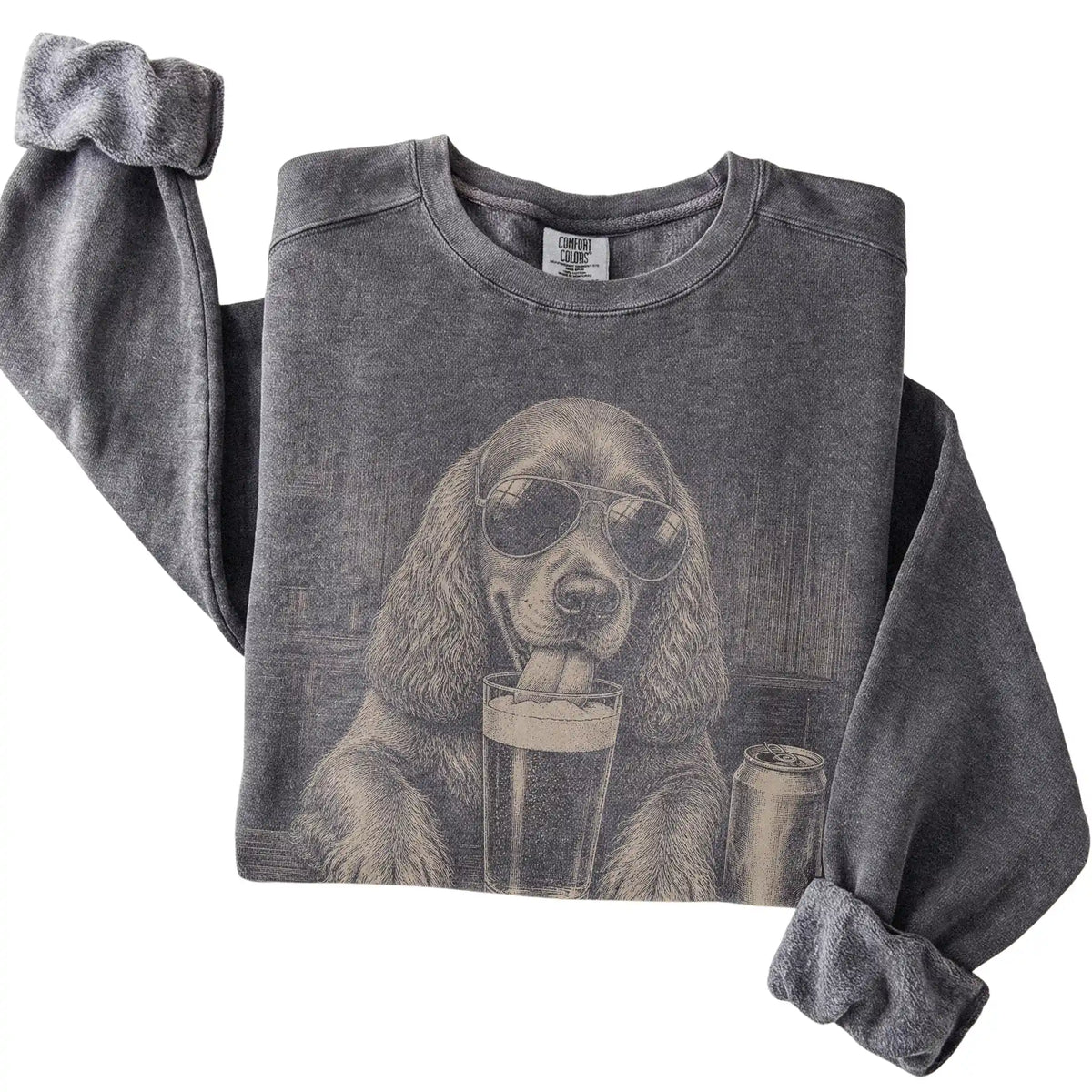 Pepper Cocker Spaniel drinking from a pint at a bar, folded detail view