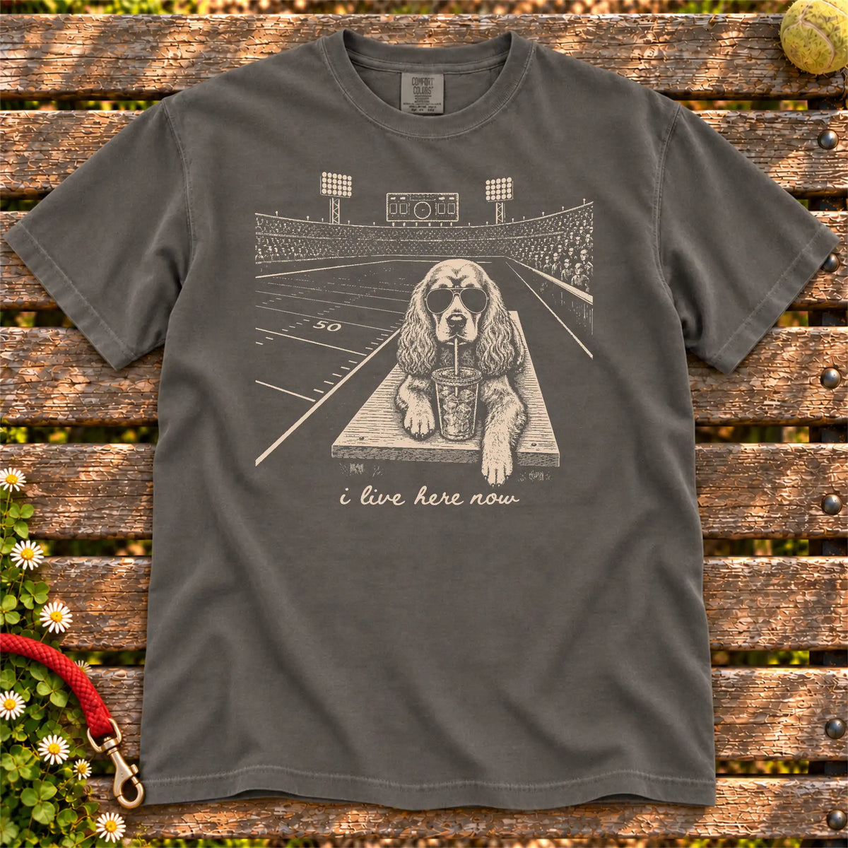 Cocker Spaniel Iced Coffee Football design on a Pepper Comfort Colors T-shirt, shown flat