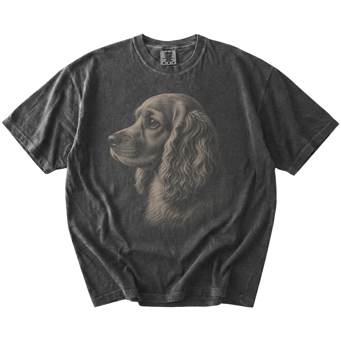 A detailed photographic portrait of a Cocker Spaniel on a Pepper Comfort Colors® T-shirt