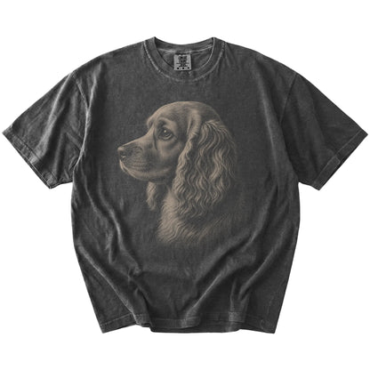 A detailed photographic portrait of a Cocker Spaniel on a Pepper Comfort Colors® T-shirt