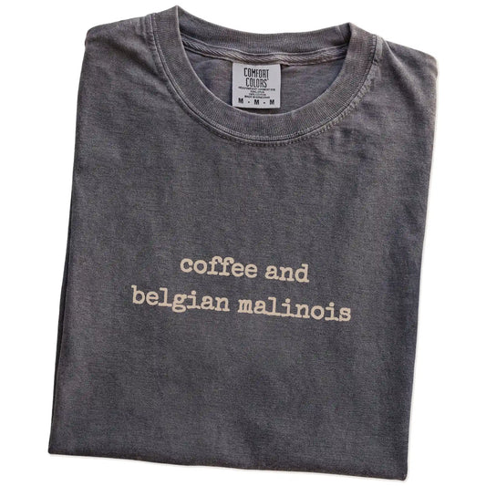 Folded Pepper Comfort Colors® T-shirt showing “coffee and belgian malinois” retro text