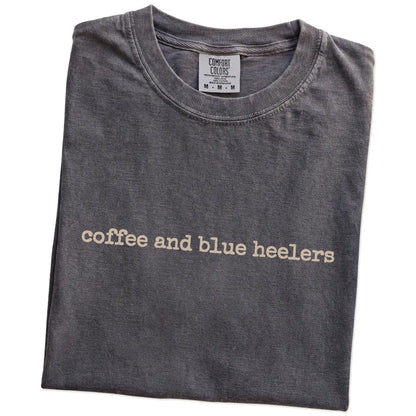 Folded Pepper Comfort Colors® T-shirt showing “coffee and blue heelers” retro text