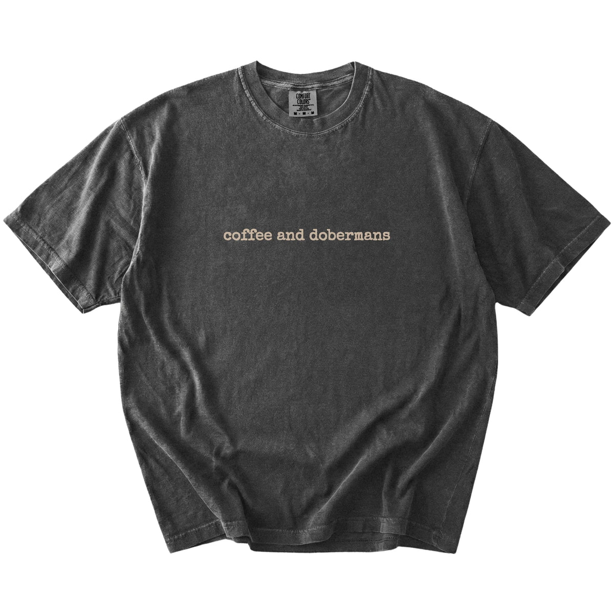 “coffee and dobermans” retro text on a Pepper Comfort Colors® T-shirt