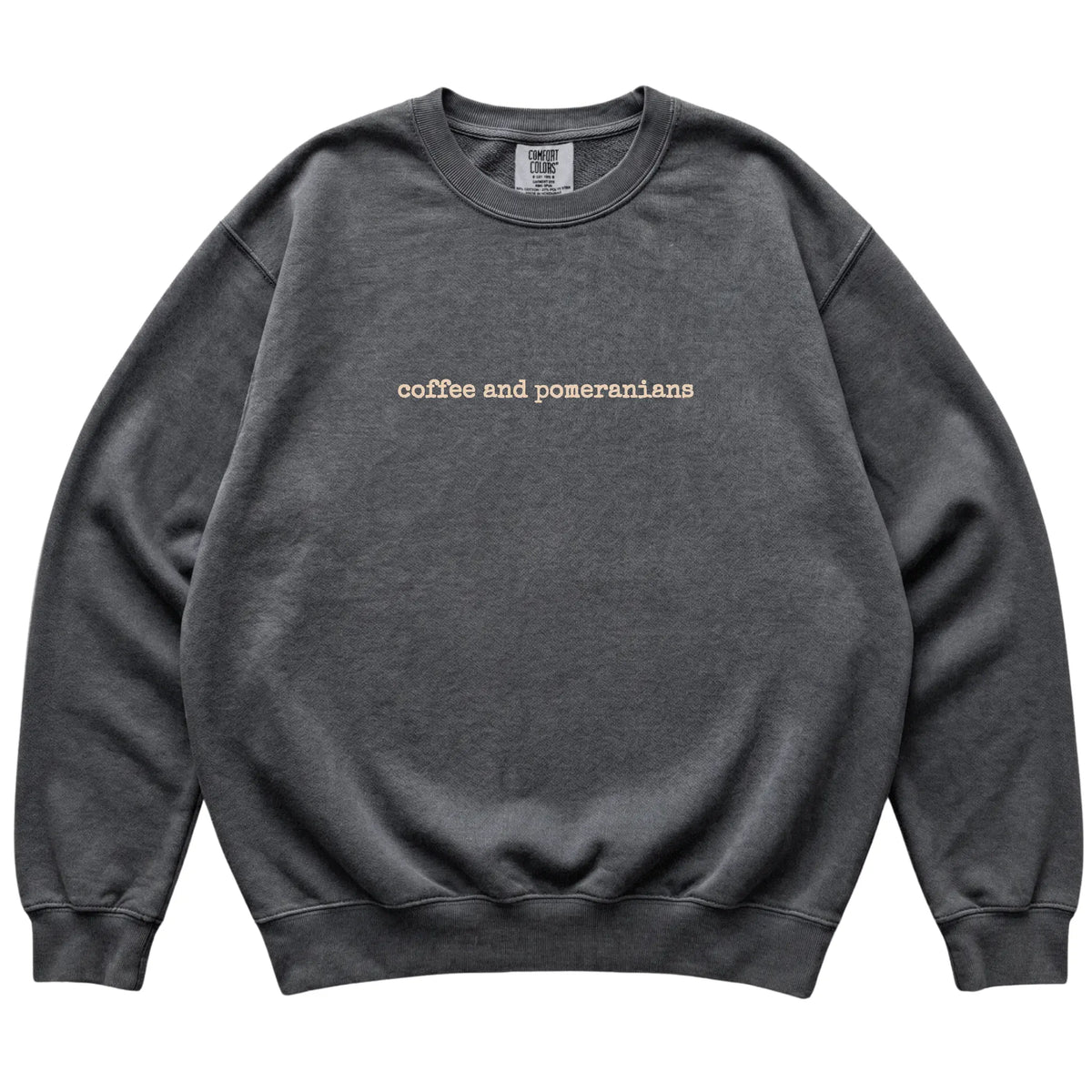 Pepper Coffee and Pomeranians Comfort Colors sweatshirt laid flat