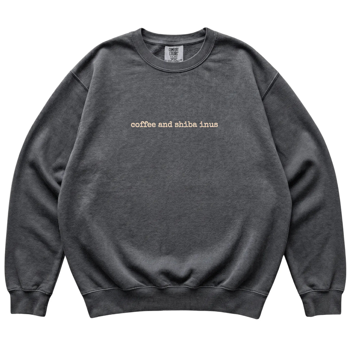 Pepper Coffee and Shiba Inus Comfort Colors sweatshirt laid flat