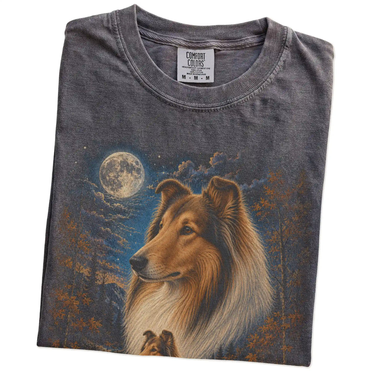 Folded pepper T-shirt with Collie Autumn Moon artwork.