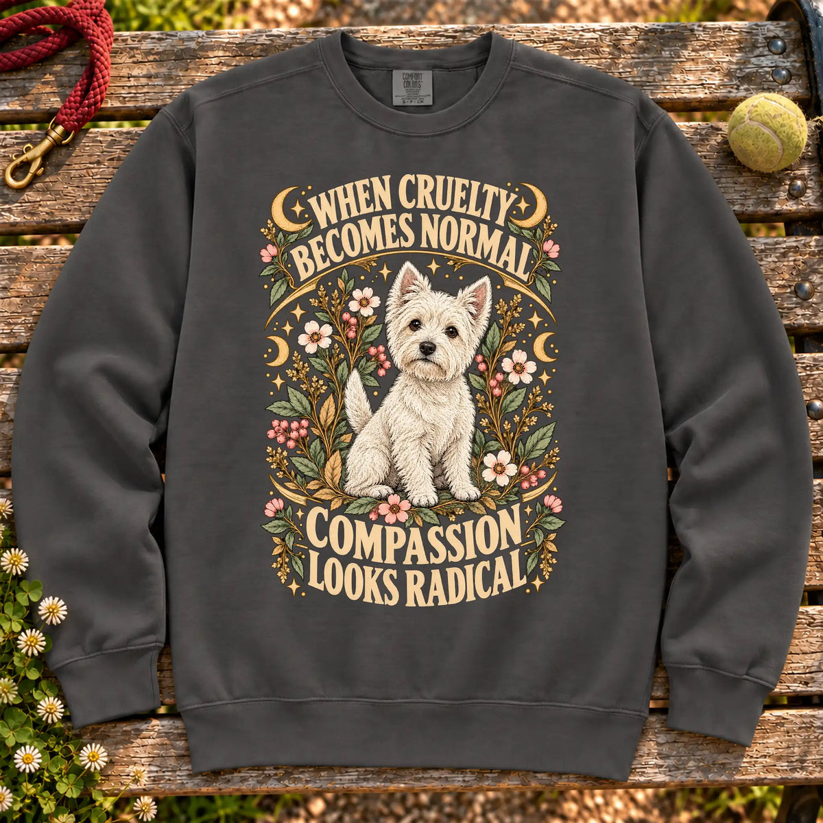 Compassion Looks Radical Westie design on a Pepper Comfort Colors sweatshirt