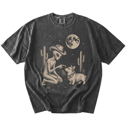 Cowboy alien fist-bumping a Corgi beneath the moon on a Pepper Comfort Colors® T-shirt