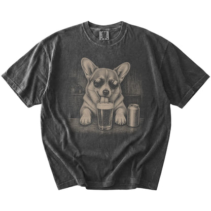 Corgi sneaking a drink from a foamy pint at home on a Pepper Comfort Colors® t-shirt