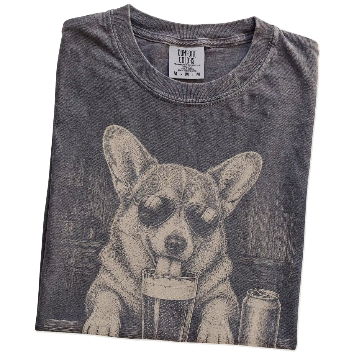 Folded Pepper Comfort Colors® t-shirt showing Corgi sneaking a drink from a pint