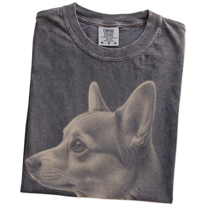 Folded Pepper Comfort Colors® T-shirt showing a detailed photographic portrait of a Corgi