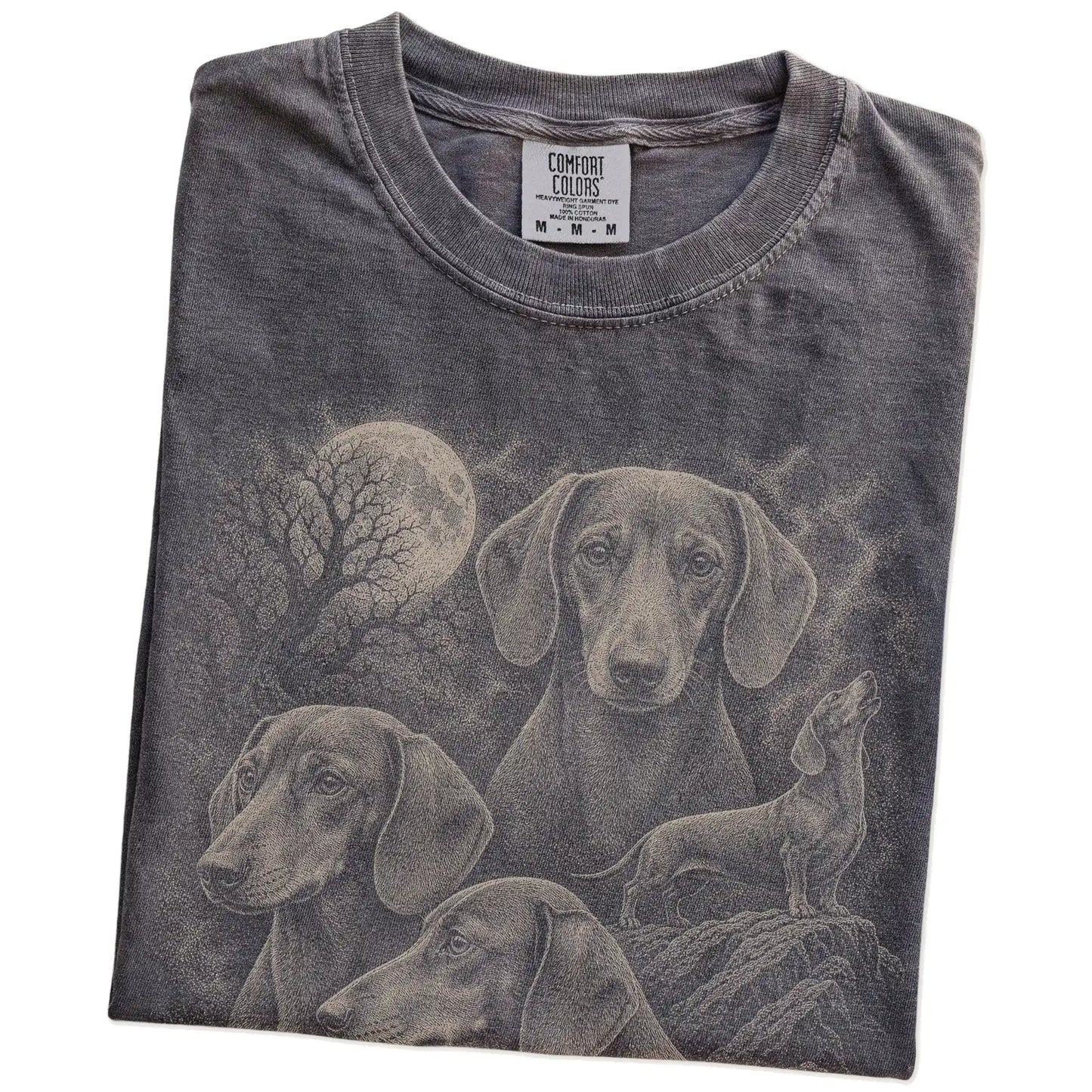 Folded Pepper Comfort Colors® T-shirt showing a vintage moon montage featuring Dachshund