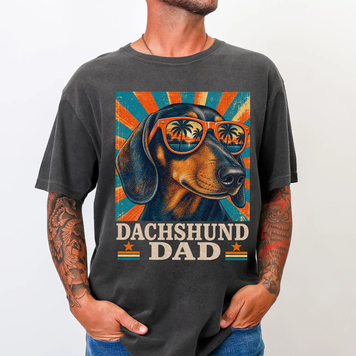Retro Dachshund Dad design on a Pepper Comfort Colors T-shirt worn by a model