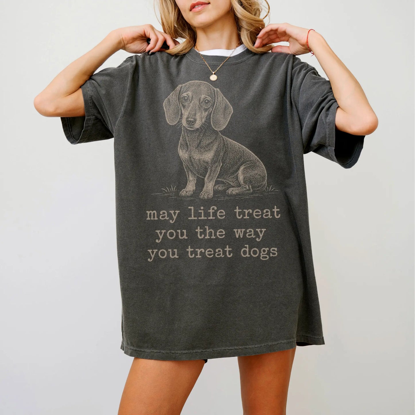 Woman wearing a Pepper Dachshund Karma T-Shirt
