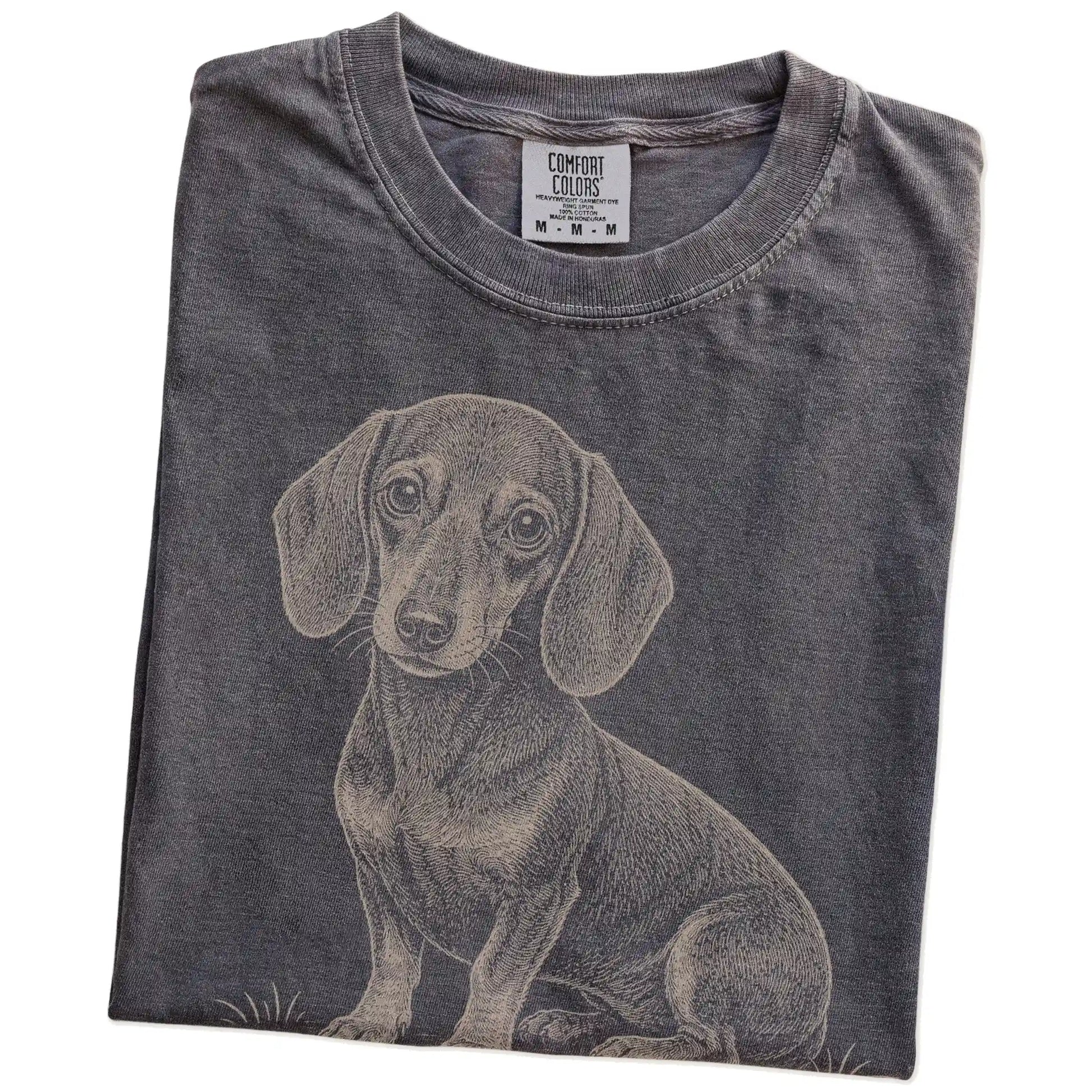 Folded Pepper Dachshund Karma T-Shirt showing the graphic