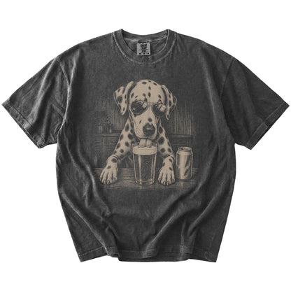Dalmatian sneaking a drink from a foamy pint at home on a Pepper Comfort Colors® t-shirt