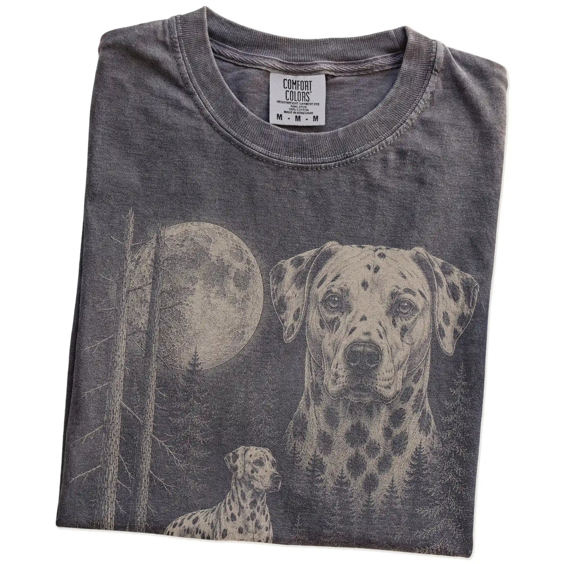 Folded Pepper Dalmatian Moonlit Forest T-Shirt showing the graphic