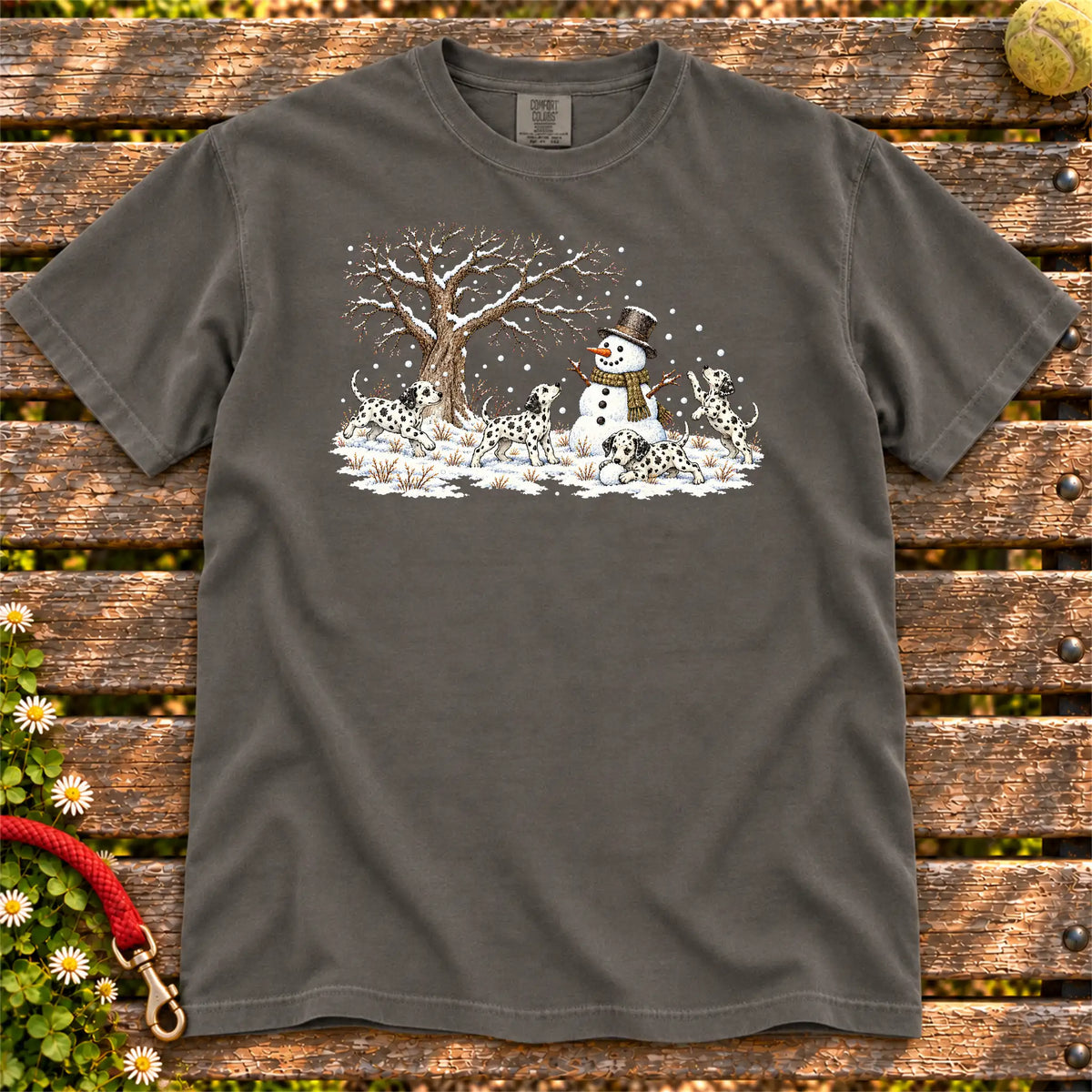 Dalmatian puppies playing in snow with a snowman on a Pepper T-shirt