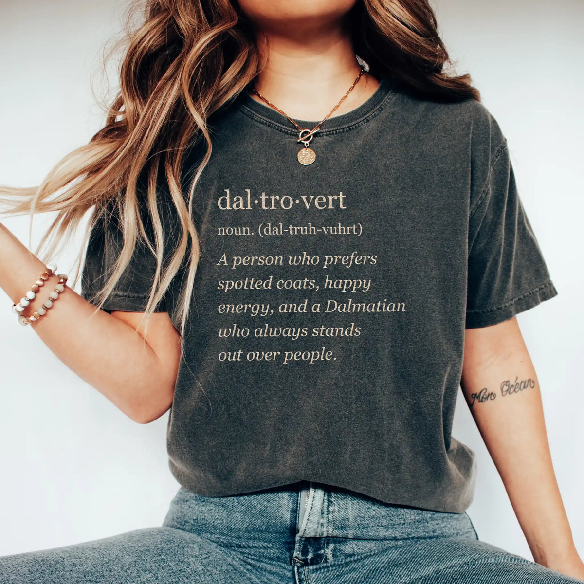 Woman wearing a Pepper Dalmatian Tro-Vert Comfort Colors T-shirt