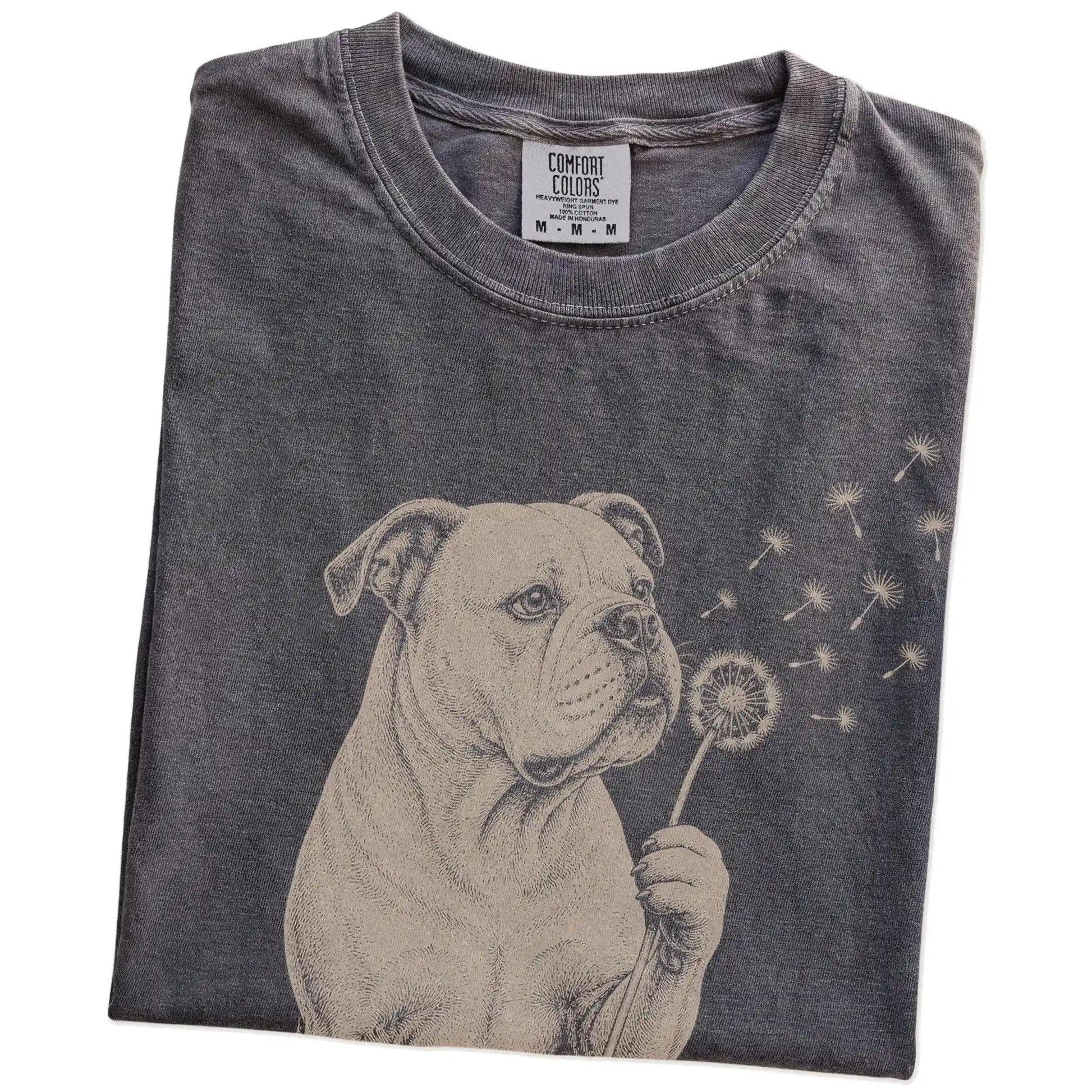Folded Pepper Comfort Colors® T-shirt showing American Bulldog portrait with drifting dandelion seeds
