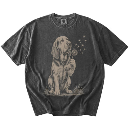 Bloodhound portrait with drifting dandelion seeds on a Pepper Comfort Colors® T-shirt