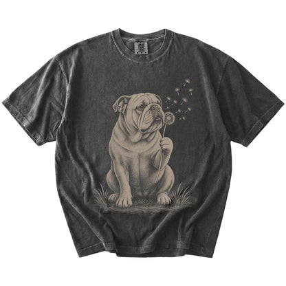 Bulldog portrait with drifting dandelion seeds on a Pepper Comfort Colors® T-shirt