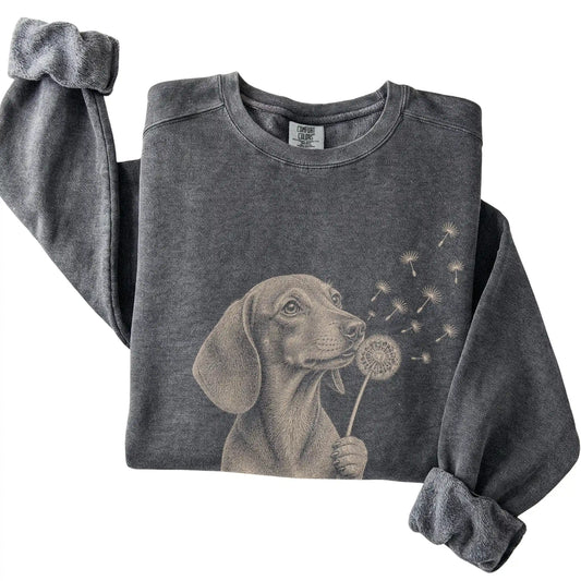 Pepper Comfort Colors® sweatshirt featuring Dandelion Dachshund, folded presentation