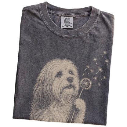 Folded Pepper Comfort Colors® T-shirt showing Havanese portrait with drifting dandelion seeds