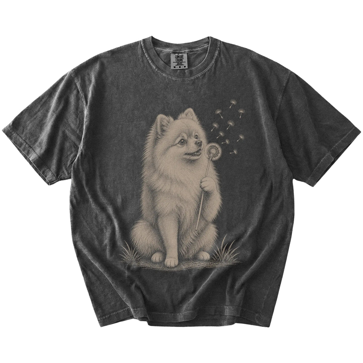 Pomeranian portrait with drifting dandelion seeds on a Pepper Comfort Colors® T-shirt