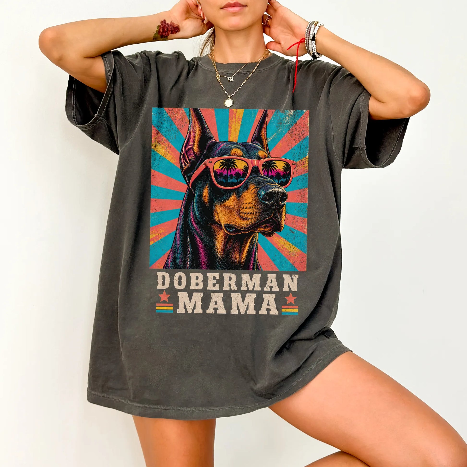 Retro Doberman Mama design on a Pepper Comfort Colors T-shirt worn by a model