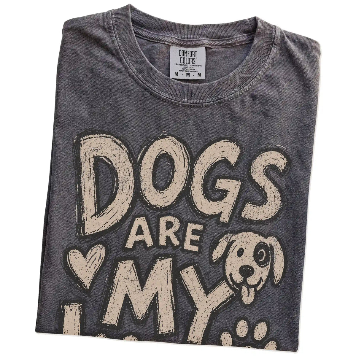 Folded Pepper Comfort Colors® T-shirt showing dogs are my kind of people lettering