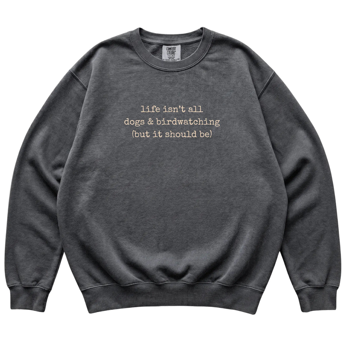 Pepper Dogs and Birdwatching Comfort Colors sweatshirt laid flat