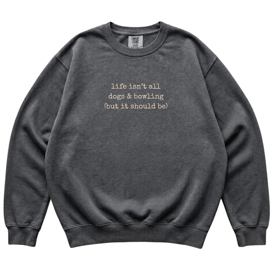 Pepper Dogs and Bowling Comfort Colors sweatshirt laid flat