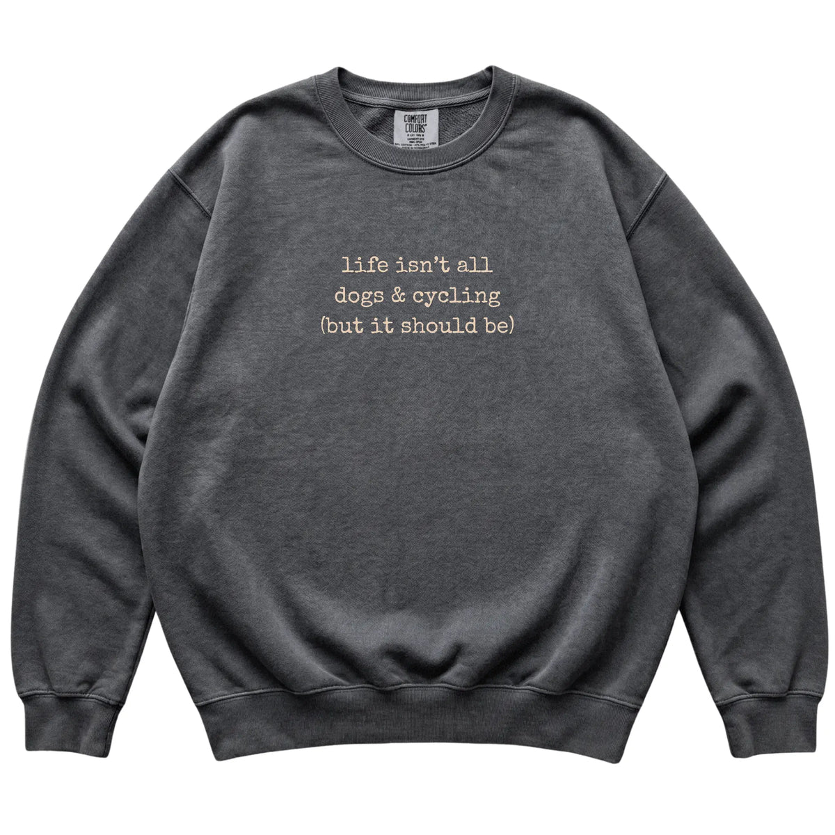 Pepper Dogs and Cycling Comfort Colors sweatshirt laid flat