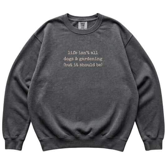 Pepper Dogs and Gardening Comfort Colors sweatshirt laid flat