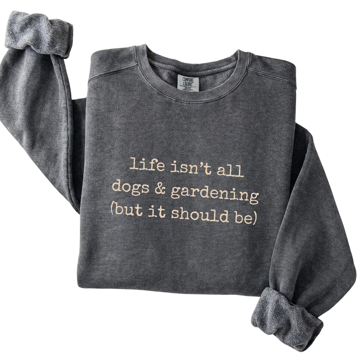 Pepper Dogs and Gardening Comfort Colors sweatshirt folded to show the printed design