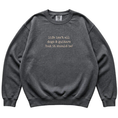 Pepper Dogs and Guitars Comfort Colors sweatshirt laid flat