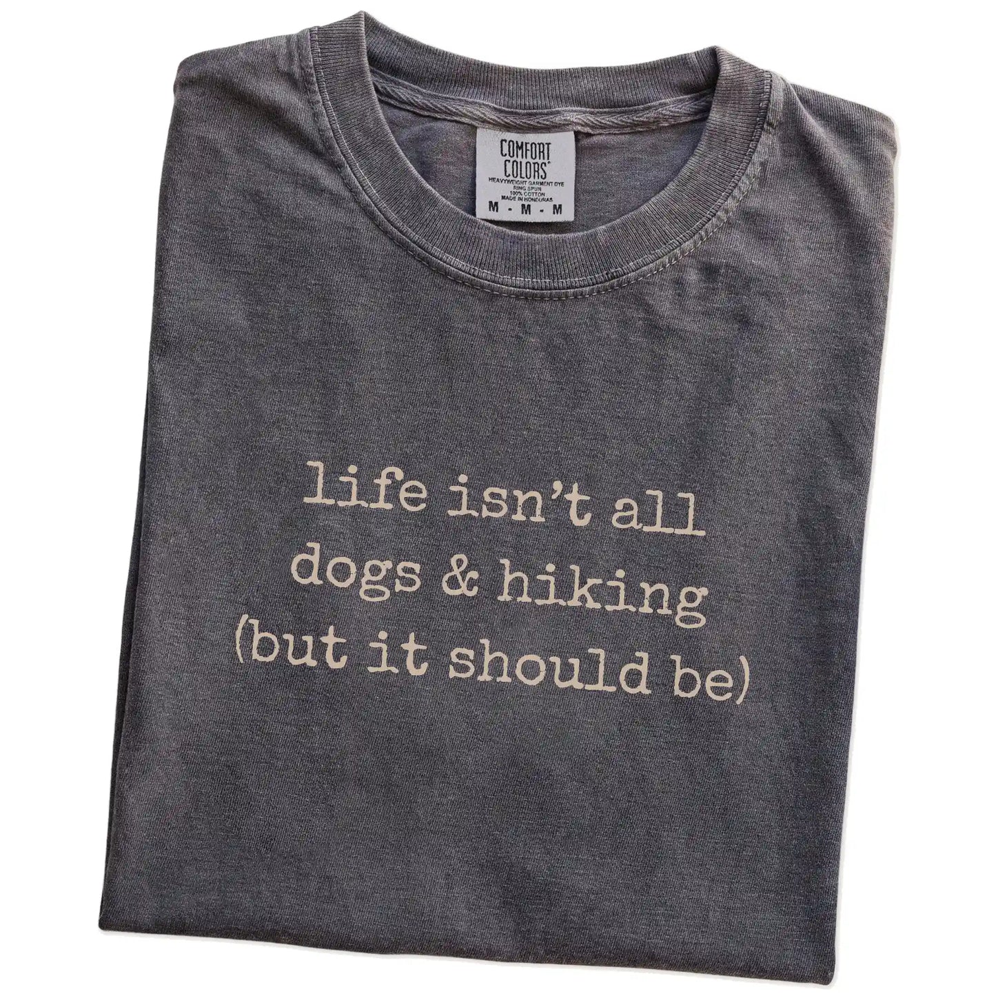 Folded Pepper Comfort Colors® T-shirt showing dog-themed hiking graphic