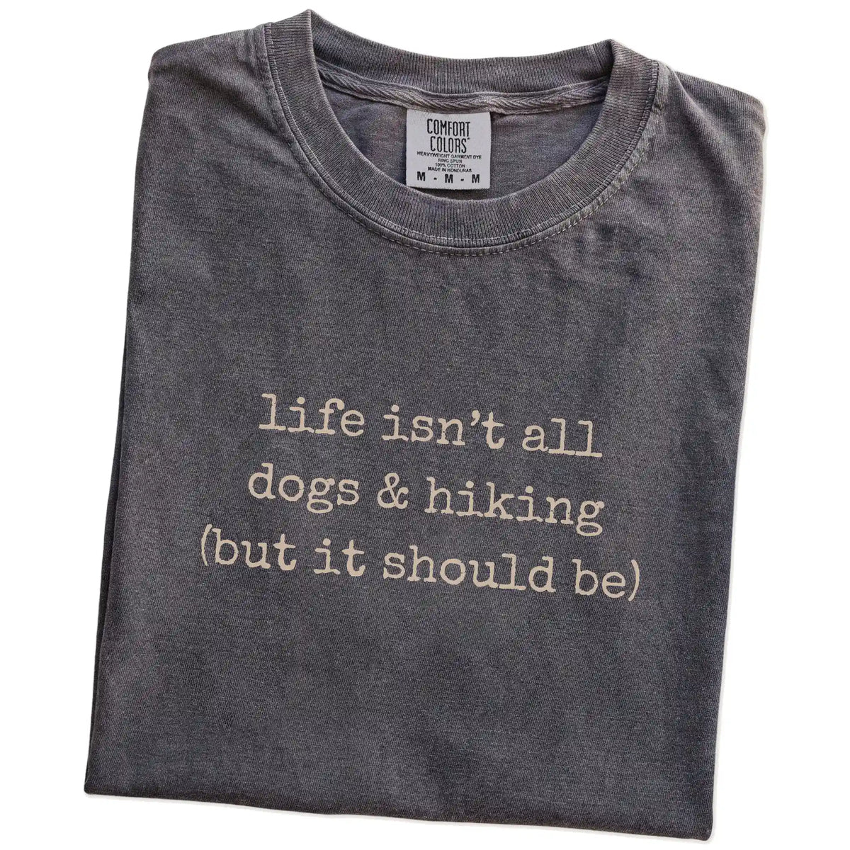 Folded Pepper Comfort Colors® T-shirt showing dog-themed hiking graphic