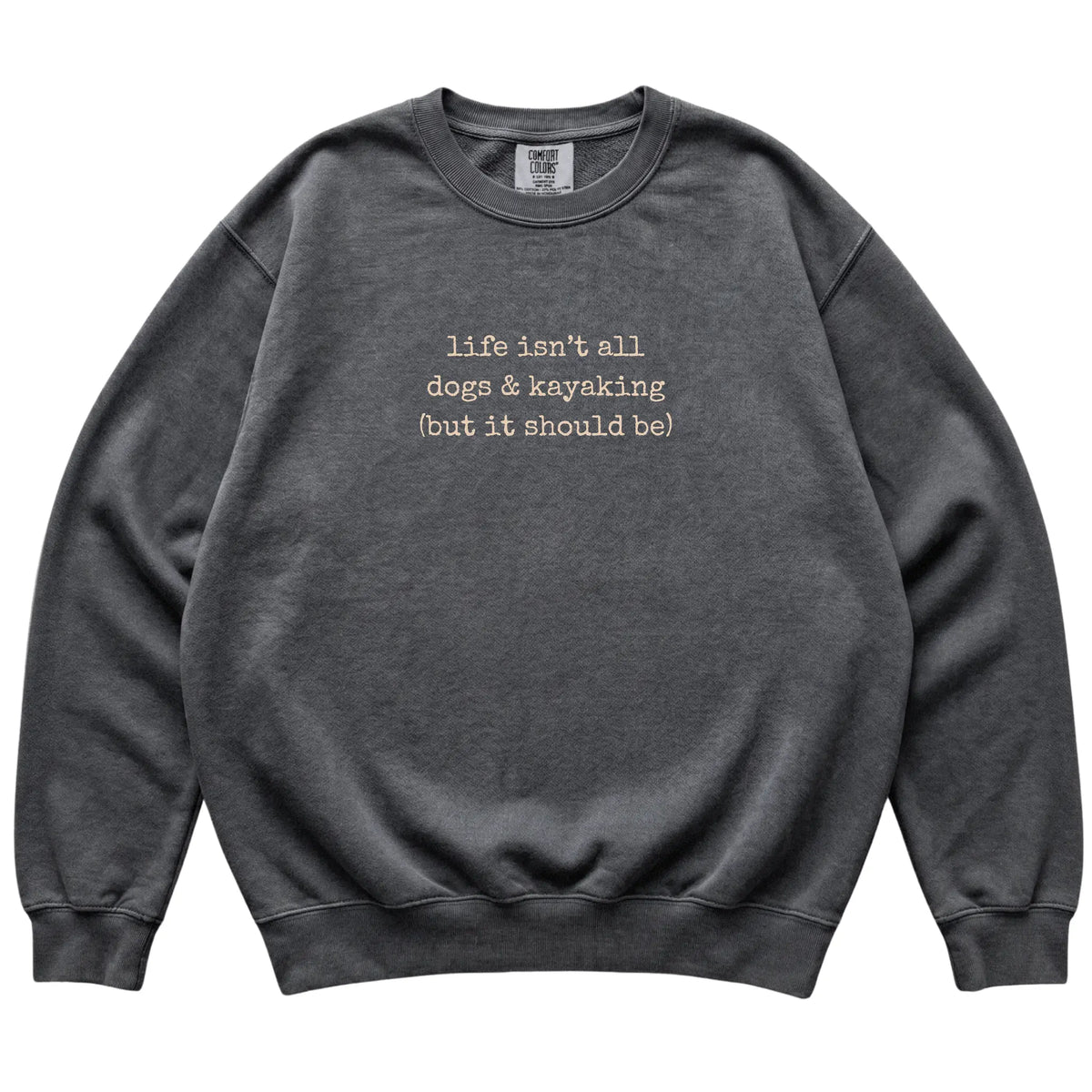 Pepper Dogs and Kayaking Comfort Colors sweatshirt laid flat