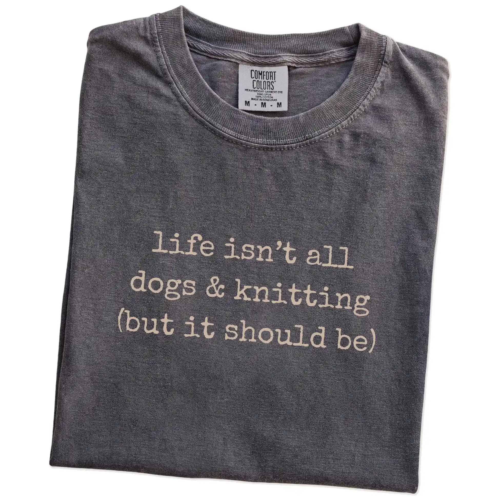 Folded Pepper Comfort Colors® T-shirt showing dog-themed knitting graphic