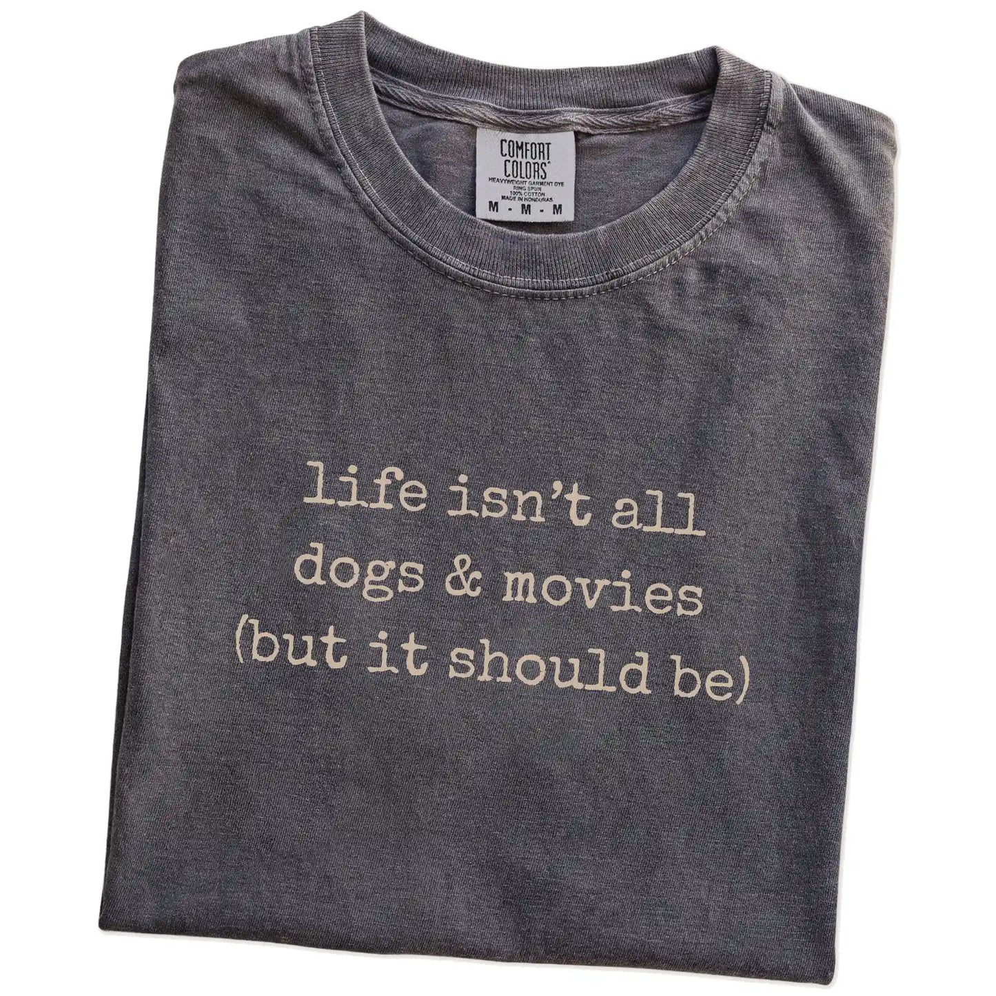 Folded Pepper Comfort Colors® T-shirt showing dog-themed movies graphic
