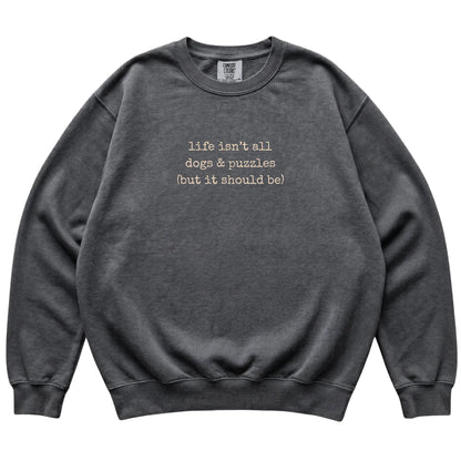 Pepper Dogs and Puzzles Comfort Colors sweatshirt laid flat